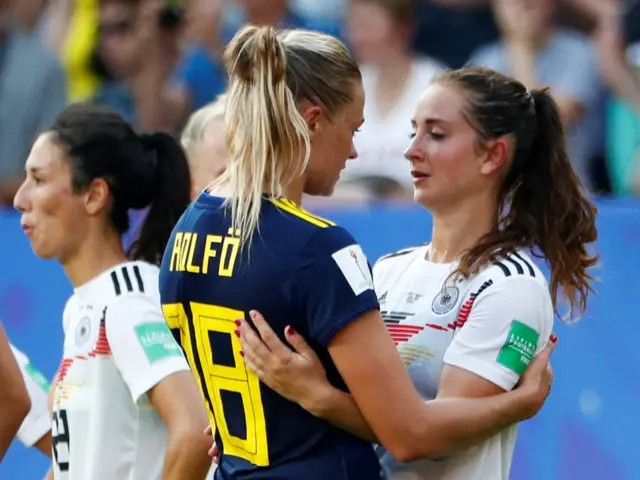 Sweden's Fridolina Rolfo consoles Germany's Sara Daebritz