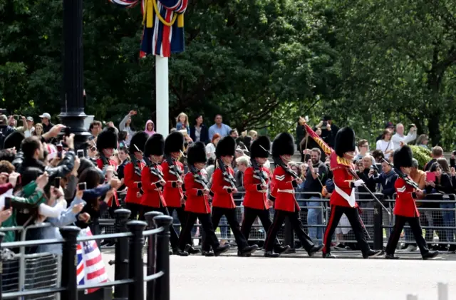 A changing of the guard takes place outside Buckingham Palace, London, during the first day of a state visit to the UK by US President Donald Trump