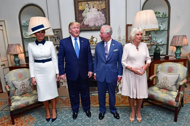 US President Donald Trump and his wife Melania (left) at Clarence House in London to take tea with the Prince of Wales and Duchess of Cornwall on the first day of his state visit to the UK.