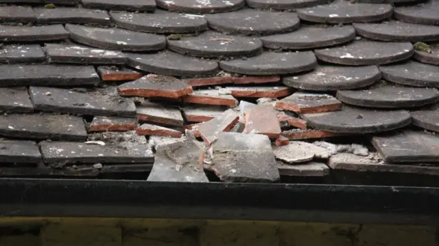 Smashed roof tiles