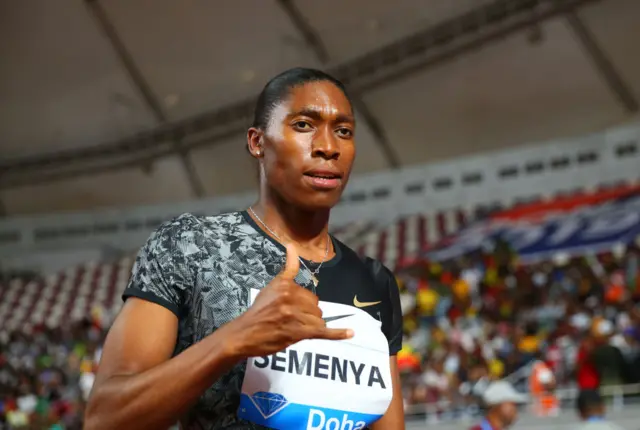 Caster Semenya gestures on the race track