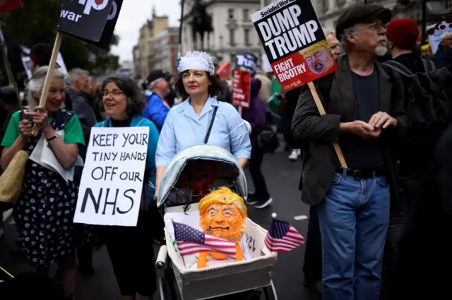 Protesters with a Trump effigy