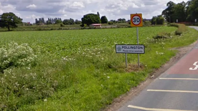 A road sign for Pollington