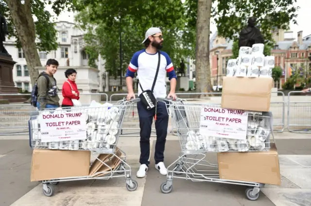 Man selling Trump toilet paper