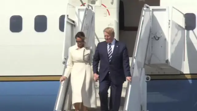 Donald and Melania Trump leave Air Force One.