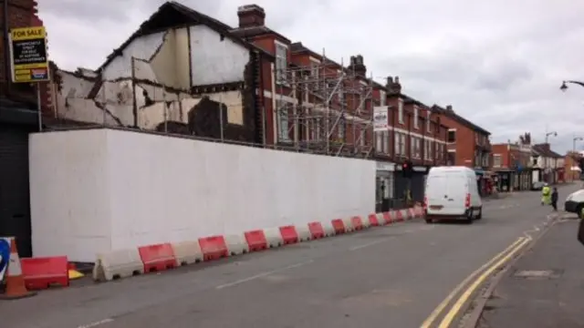 The road and building after demolition