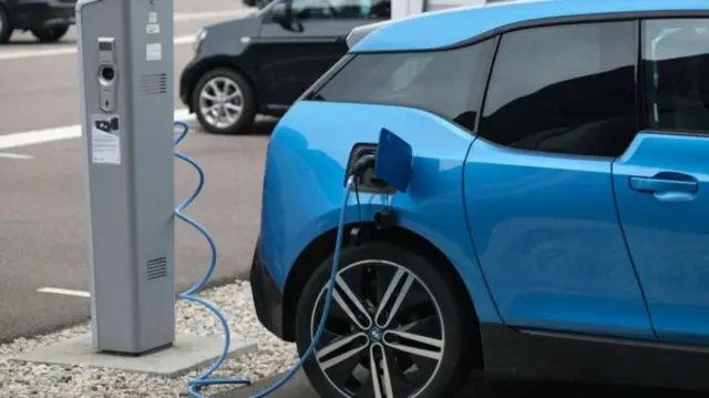 An electric car being charged