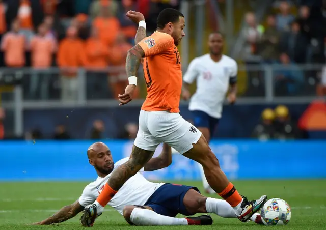 Fabian Delph makes a challenge for England