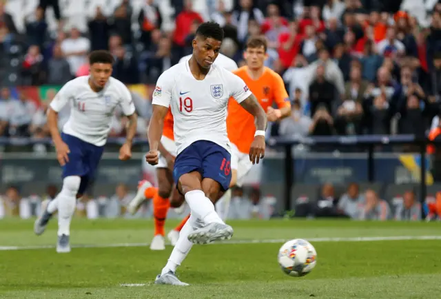 Marcus Rashford scores from the penalty spot