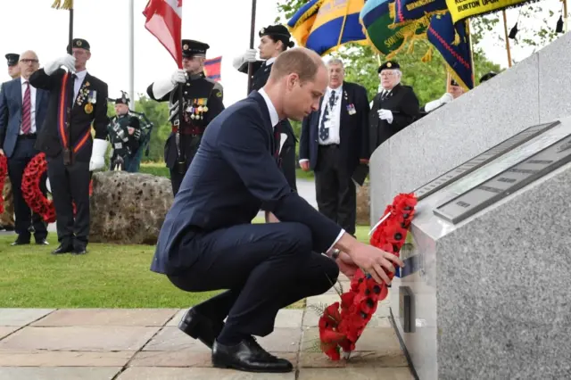 Prince William lays a wreath at the Bayeux Cathedral