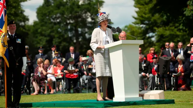 Theresa May at the Bayeux war cemetery