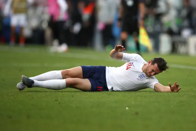 Ben Chilwell falls to the ground after a challenge