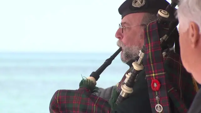 A piper in Arromanches