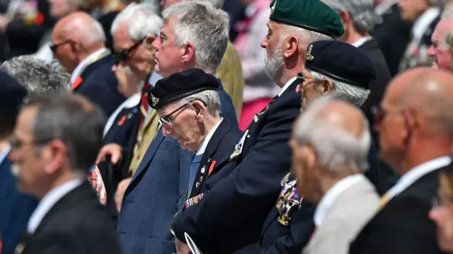 Veterans at the ceremony at the Bayeux war cemetery.