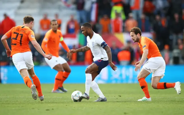 Raheem Sterling runs forward for England