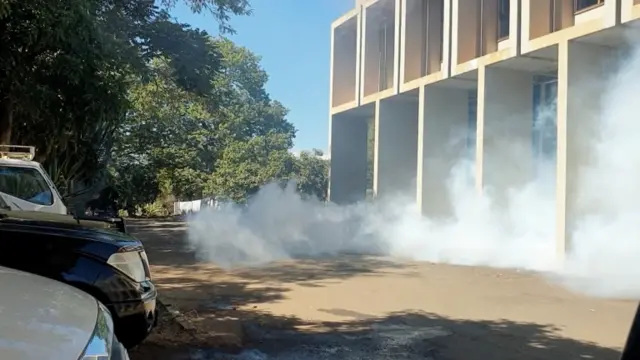 Teargas is seen outside the Malawi Congress Party headquarters in Lilongwe