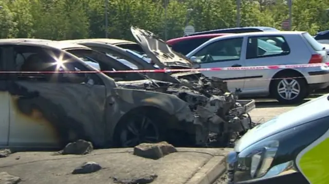 Burned cars at HMP Lowdham Grange