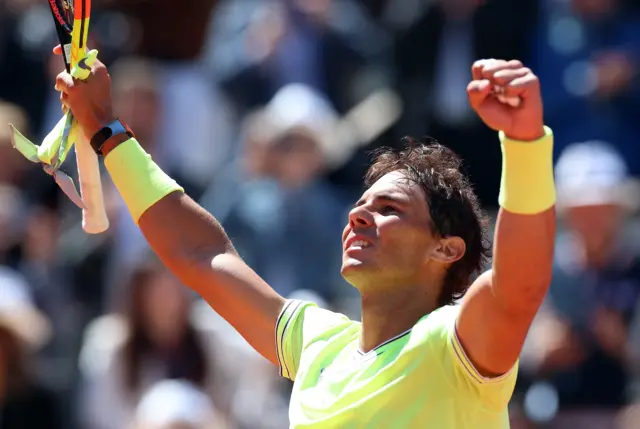 Rafa Nadal celebrates his win over Roger Federer