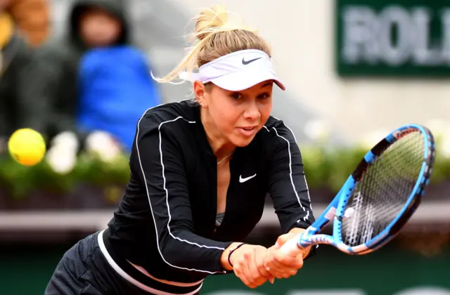 Anisimova hits a backhand