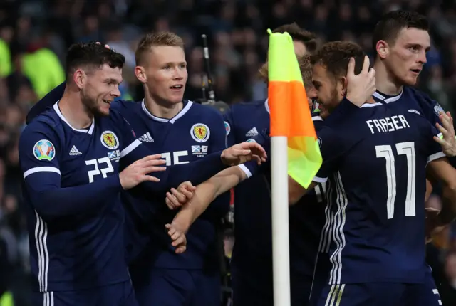 Oliver Burke celebrates