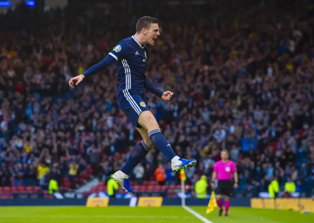 Andy Robertson celebrates his third international goal - and it was a beauty.