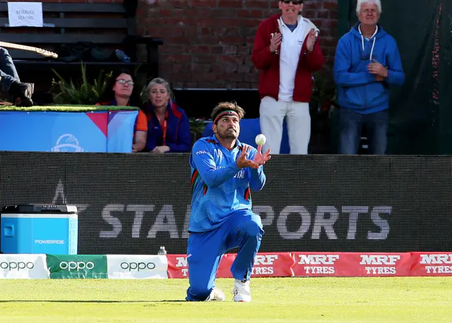 Afghanistan's Hamid Hassan catches New Zealand's Colin Munro