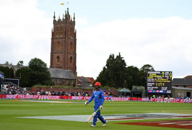 Noor Ali Zadran walks off after being dismissed for 31