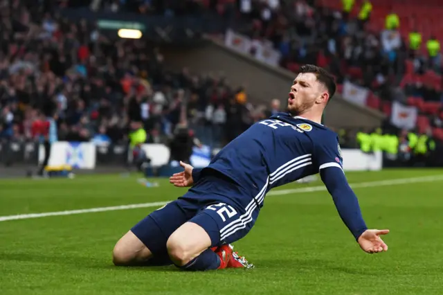 Oliver Burke celebrates his dramatic late winner