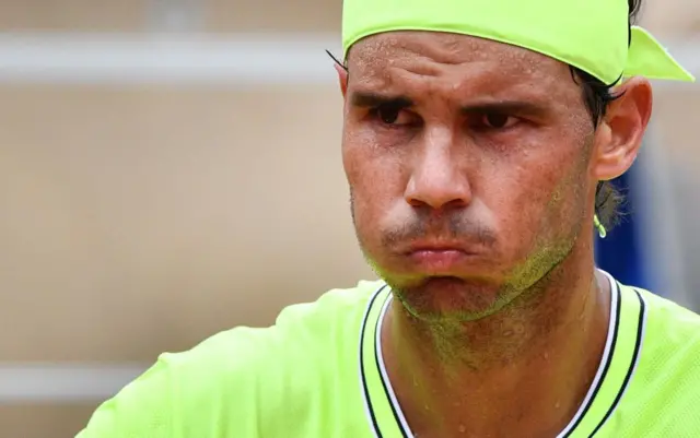 Nadal blows his cheeks out