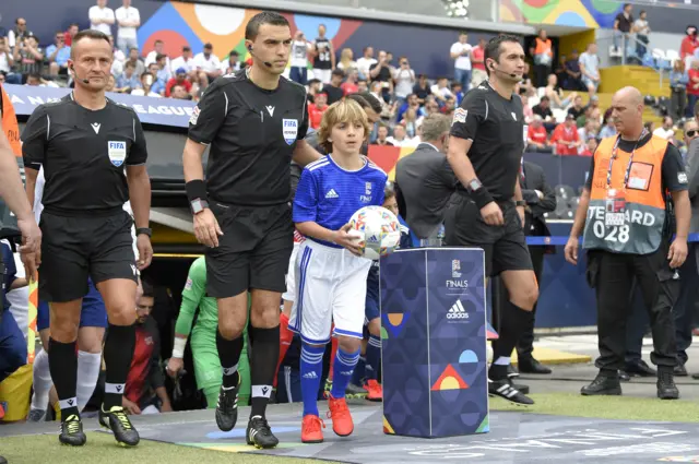 England and Switzerland walk onto the pitch