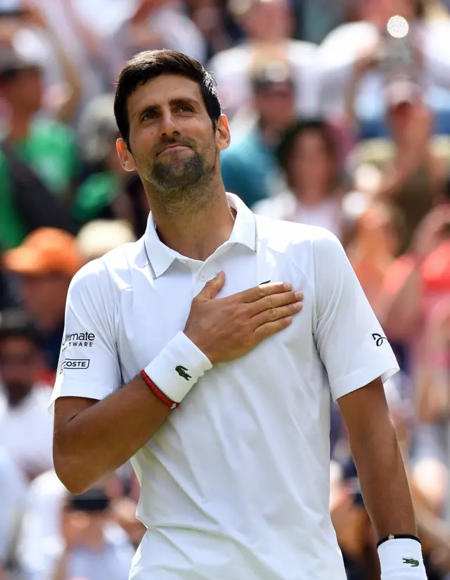 Novak Djokovic celebrates winning his opening match