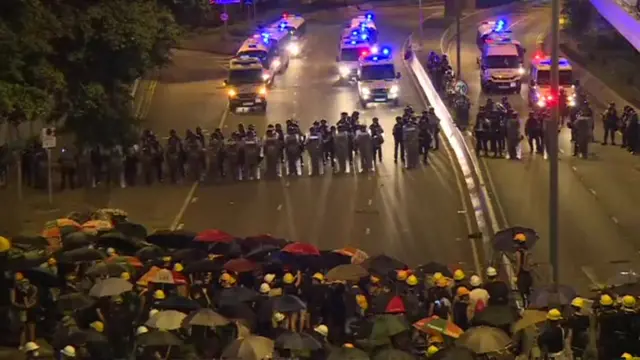 Police approach protesters