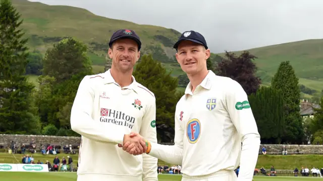 Opposing captains Dane Vilas (left) and Durham's Cameron Bancroft