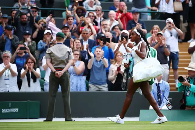 Fans applaud Cori Gauff off the court