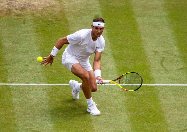 Rafael Nadal hits a forehand