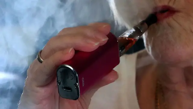 Woman vaping