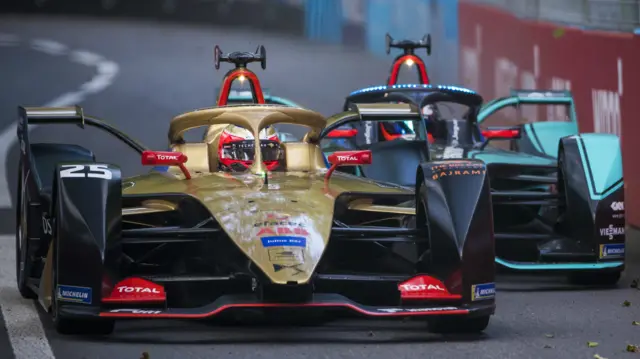 Formula E cars battle on track at Bern