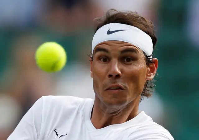Rafael Nadal takes evasive action
