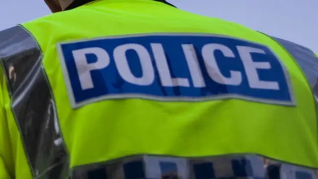 Generic view of police badge on a hi-vis jacket