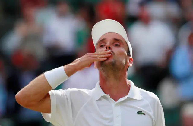 Roberto Bautista Agut celebrates