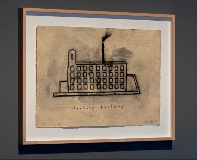 A lithograph of a factory