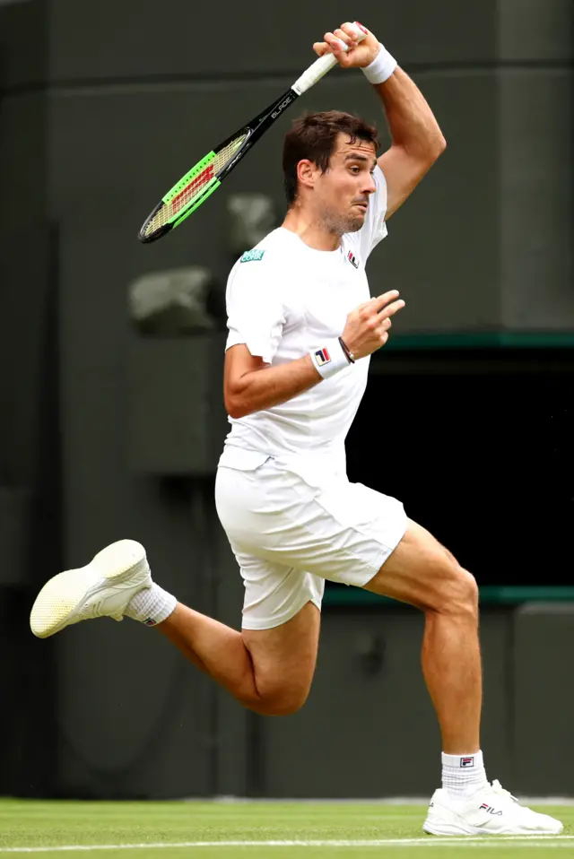 Guido Pella hits a forehand winner