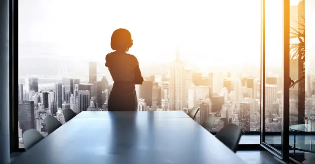 Woman in board room