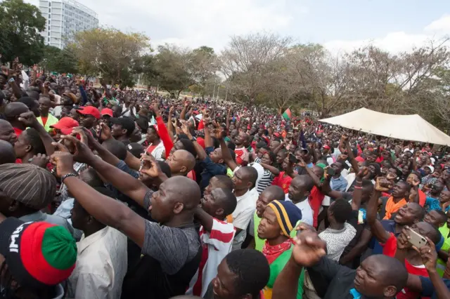 Opposition protesters in Malawi march to the parliament on 4 July 2019.