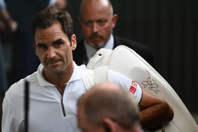 Roger Federer leaves Centre Court