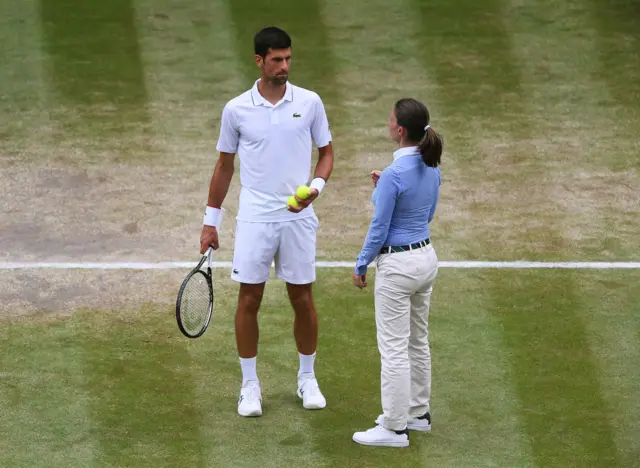 Umpire Eva Asderaki-Moore with Novak Djokovic