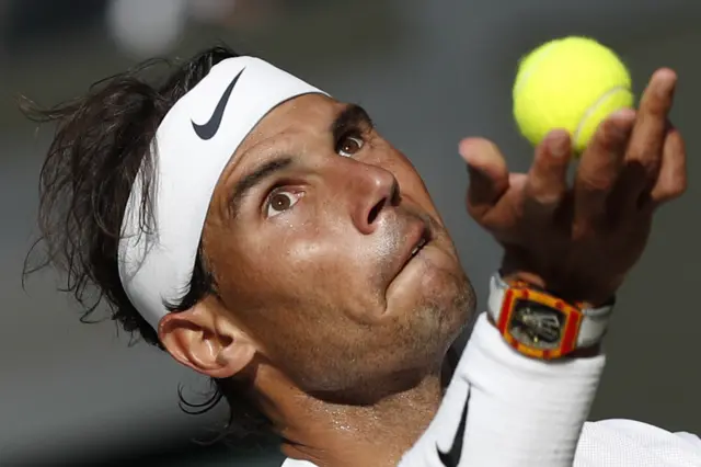 Rafael Nadal prepares to serve