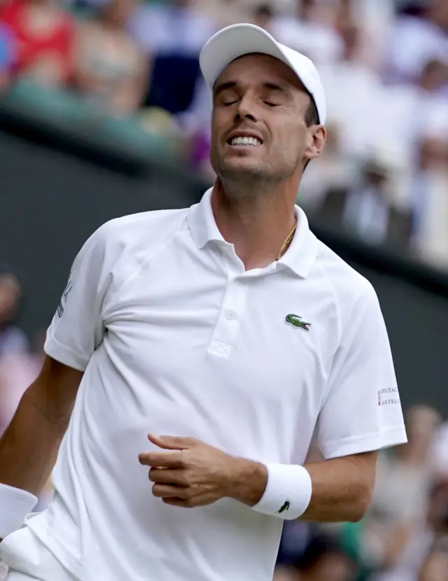 Roberto Bautista Agut reacts with dismay