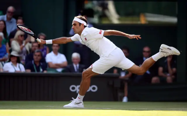 Roger Federer hits a forehand