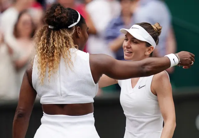 Williams and Halep hug